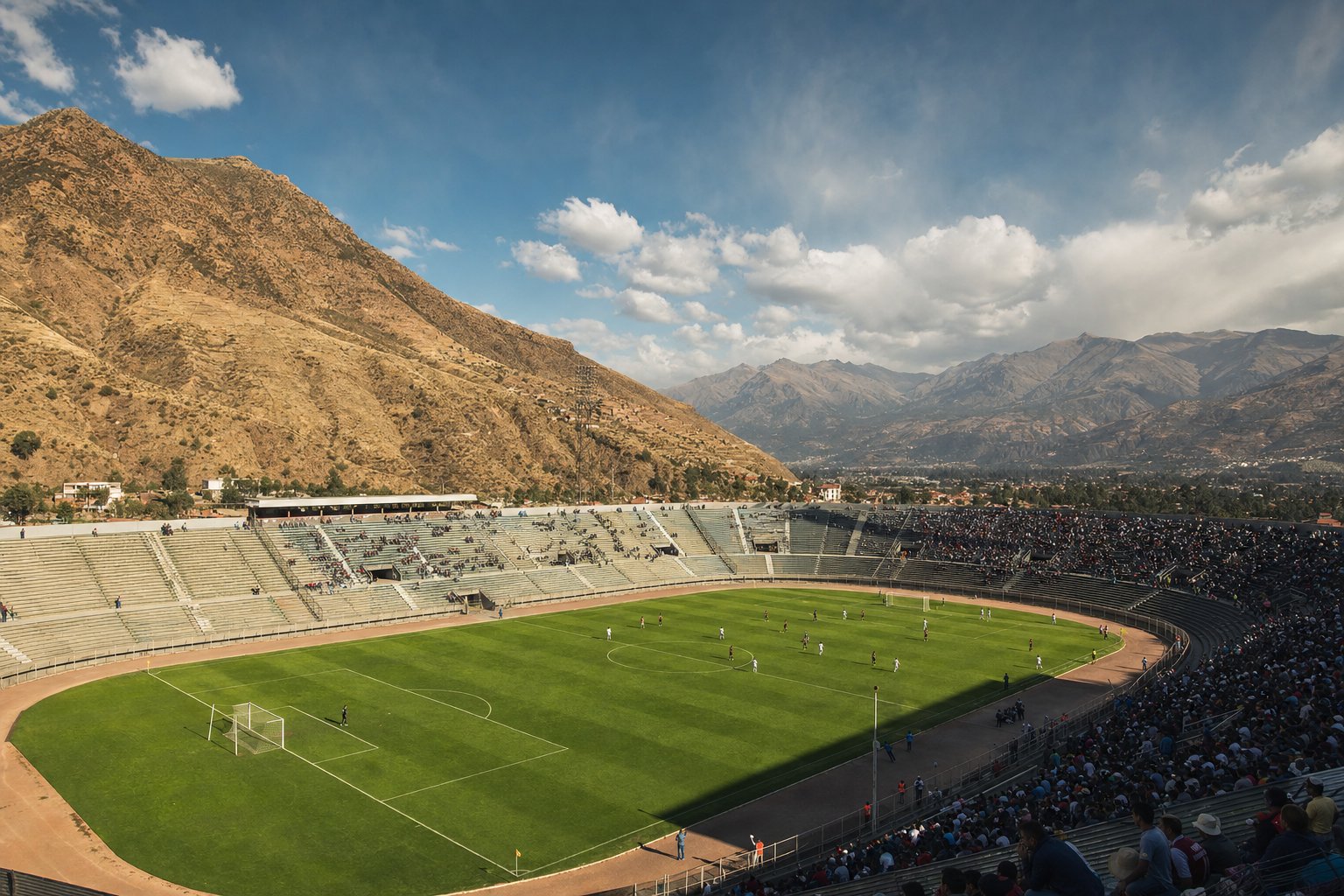 Estadio de fútbol chileno con los cerros de la cordillera al fondo
